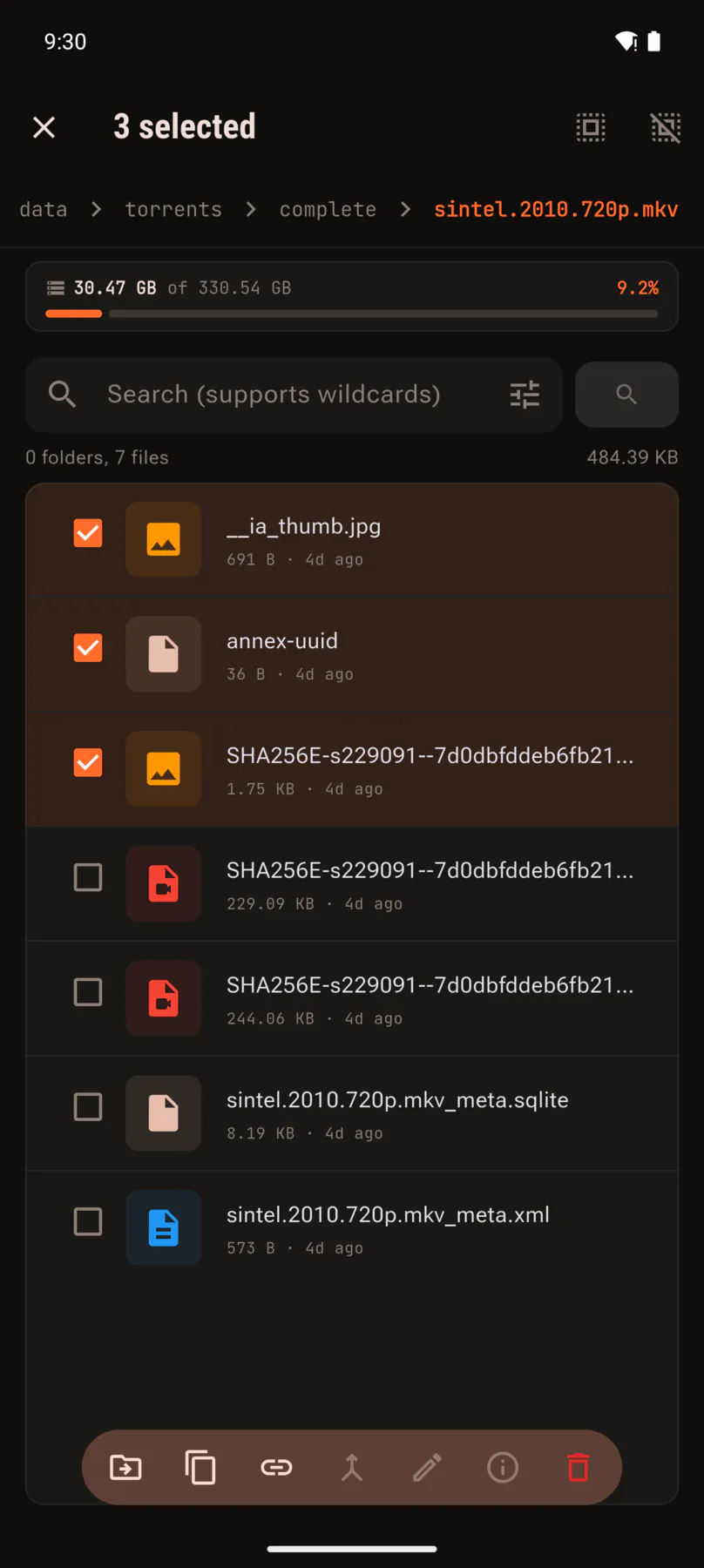 Three files selected with a toolbar of move, copy, rename and delete.